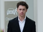Didier Gaspard Owen Maximilien arrives at the State Courts building in Singapore, Thursday, July. 30, 2026. (AP Photo/David Hu)