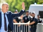 Zinedine Zidane waves to fans in Paris after his appointment as France head coach on Tuesday. 