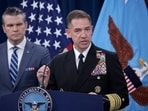 Defense Secretary Pete Hegseth with Adm. Brad Cooper at a Pentagon press briefing in April.