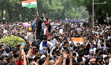The Narendra Modi government agreeing to drop its education minister in the aftermath of an agitation is only the third instance of this 12-year-long government bowing down to a popular agitation. (AFP)