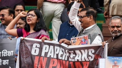 The BJP protesters, including several party MPs, MLAs and state office bearers, alleged that papers of six exams were leaked, impacting the future of 30 lakh students in the state. (ANI)