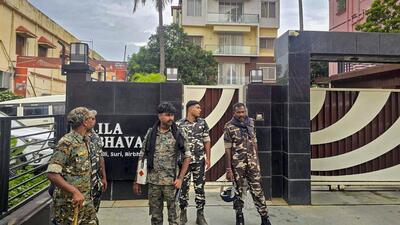 Birbhum: Security officials stand guard outside the residence of absconding stone trader Tullu Mondal, during a raid, at Suri in West Bengal's Birbhum district, Thursday, July 30, 2026 (PTI)