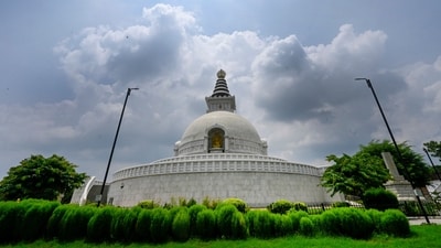 Gram it: Monsoon clouds hover over the Shanti Stupa at Millennium Park, creating a dramatic skyline. After the heavy downpour in the city on Tuesday, the The India Meteorological Department (IMD) has predicted moderate to heavy rainfall for Friday. (Photo: Sanjeev Verma/HT)