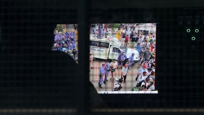 A police officer monitors CCTV footage from a mobile command-and-control vehicle at the Jantar Mantar protest site, where India's Cockroach Janta Party (CJP) supporters gathered, last week. (Reuters File Photo)