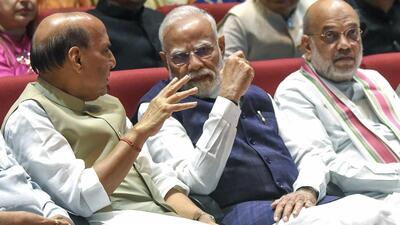 Prime Minister Narendra Modi with Union home Minister Amit Shah and defence minister Rajnath Singh at the GMC Balayogi Auditorium in New Delhi on Tuesday. (ANI FILE) Prime Minister Narendra Modi with Union home Minister Amit Shah and defence minister Rajnath Singh at the GMC Balayogi Auditorium in New Delhi on Tuesday. (ANI FILE)