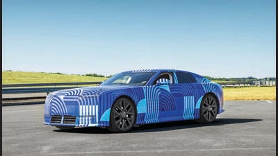 Under the camouflage, the Jaguar 01 is a big car. It’s over five metres long and it’s purely electric. Under the camouflage, the Jaguar 01 is a big car. It’s over five metres long and it’s purely electric.