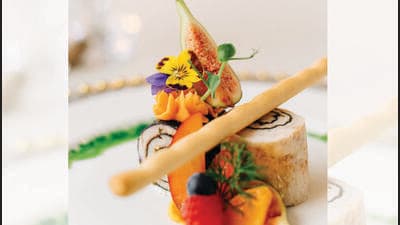 We don’t need edible flowers on every dish. It doesn’t make pizza, idli or sushi taste better. (ADOBE STOCK) We don’t need edible flowers on every dish. It doesn’t make pizza, idli or sushi taste better. (ADOBE STOCK)