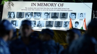 A banner shows photographs of students who allegedly took their lives following the NEET-UG 2026 paper leak, during a protest at Jantar Mantar in New Delhi. (PTI) A banner shows photographs of students who allegedly took their lives following the NEET-UG 2026 paper leak, during a protest at Jantar Mantar in New Delhi. (PTI)