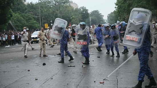 RAF personnel disperse supporters of the Cockroach Janta Party (CJP) during a protest over alleged exam irregularities in New Delhi on July 20, 2026. (AFP)