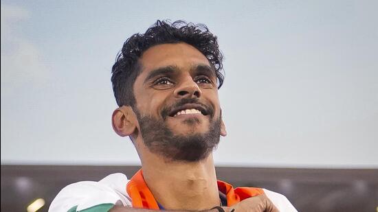 India's Murali Sreeshankar celebrates after winning a silver medal in the men's long jump final. (PTI)