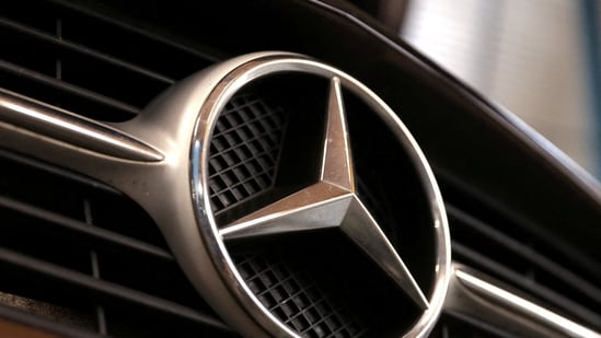 Mercedes recalls 310,667 US vehicles over a door lock issue as weak China sales, falling demand and intense competition force the carmaker to cut its forecast. (REUTERS/Dado Ruvic/Illustration/File Photo)