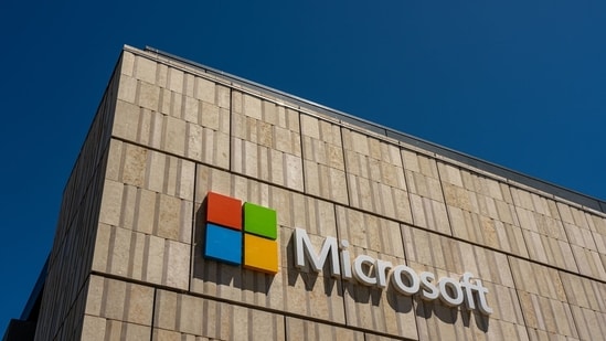 Microsoft's $41 billion AI investment boosts Azure growth, beats earnings estimates and lifts investor confidence as cloud demand continues to rise. (Photographer: David Paul Morris/Bloomberg)