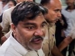 Former AAP councillor Tahir Hussain being taken as Karkardooma Court sentences life imprisonment to him.