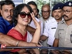 Exiled Bangladeshi author Taslima Nasreen greets people upon her arrival at the Netaji Subhas Chandra Bose International (NSCBI) Airport, in Kolkata, West Bengal, on Friday (PTI)