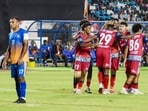 File image of players of Jamshedpur FC (red) celebrating after defeating Defenders FC, 5-0, during the 135th Durand Cup football match, in Ranchi in July. (PTI)