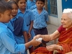 Kamal Capoor along with students from her school. (HT)
