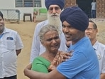 Prakasam with his mother after being reunited in Patiala. (HT) Prakasam with his mother after being reunited in Patiala. (HT)
