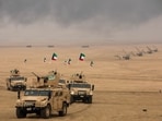 A December joint military exercise in the Kuwait desert.