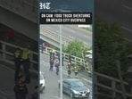 CCTV Captures Moment Food Truck Overturns On Mexico City Overpass