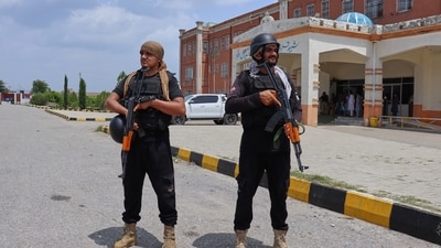 Police officers stand guard outside a hospital, where injured victims of an overnight deadly militant attack on a police post, are treated, in Hangu, a district in northwestern Pakistan, Thursday, July 30, 2026. (B.S. Gillani) Police officers stand guard outside a hospital, where injured victims of an overnight deadly militant attack on a police post, are treated, in Hangu, a district in northwestern Pakistan, Thursday, July 30, 2026. (B.S. Gillani)