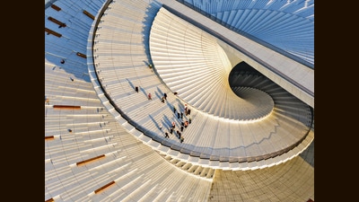 The façade of the Shanghai Grand Opera House in China forms a massive stepped space that can be climbed from the outside, and will serve as a free, 24-hour public park. (Snohetta) The façade of the Shanghai Grand Opera House in China forms a massive stepped space that can be climbed from the outside, and will serve as a free, 24-hour public park. (Snohetta)