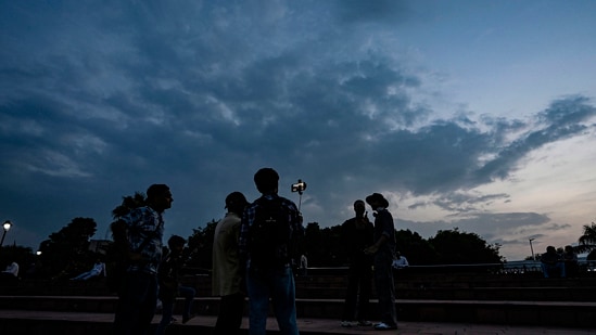 Gram it: Clouds hover over Connaught Place in Delhi. Delhiites having been waiting for Rain God to show mercy and respite from humidity. (Photo:Sanjeev Verma/ Hindustan Times)
