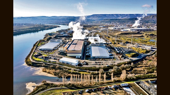 Vapour rises as a result of cooling operations at an AI data centre campus along the Columbia River in Oregon. (Adobe Stock)