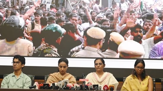 The families urged authorities to ensure justice for the injured officers.
