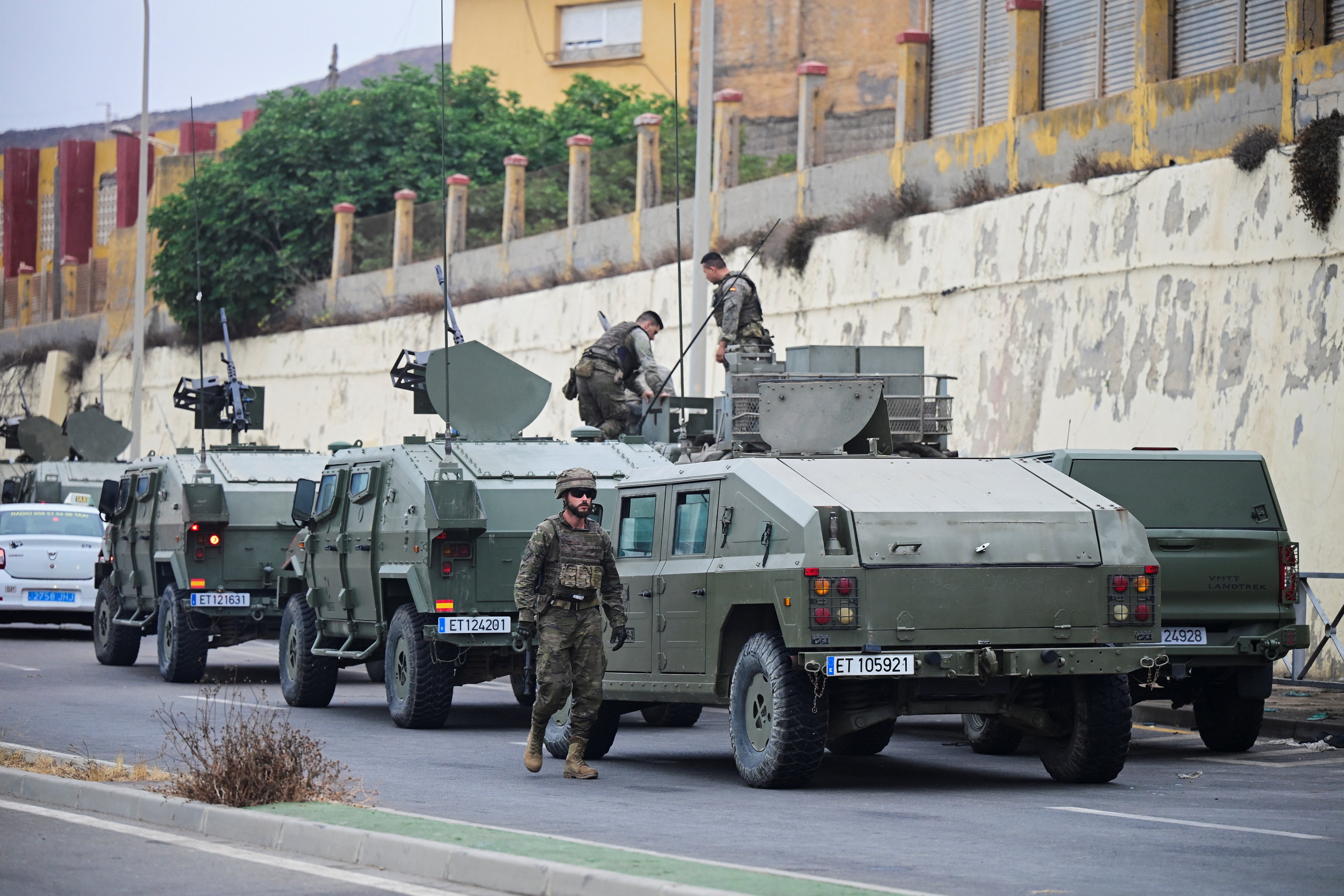 Spanish soldiers patrol near the Spanish-Moroccan border in Ceuta. (Reuters)