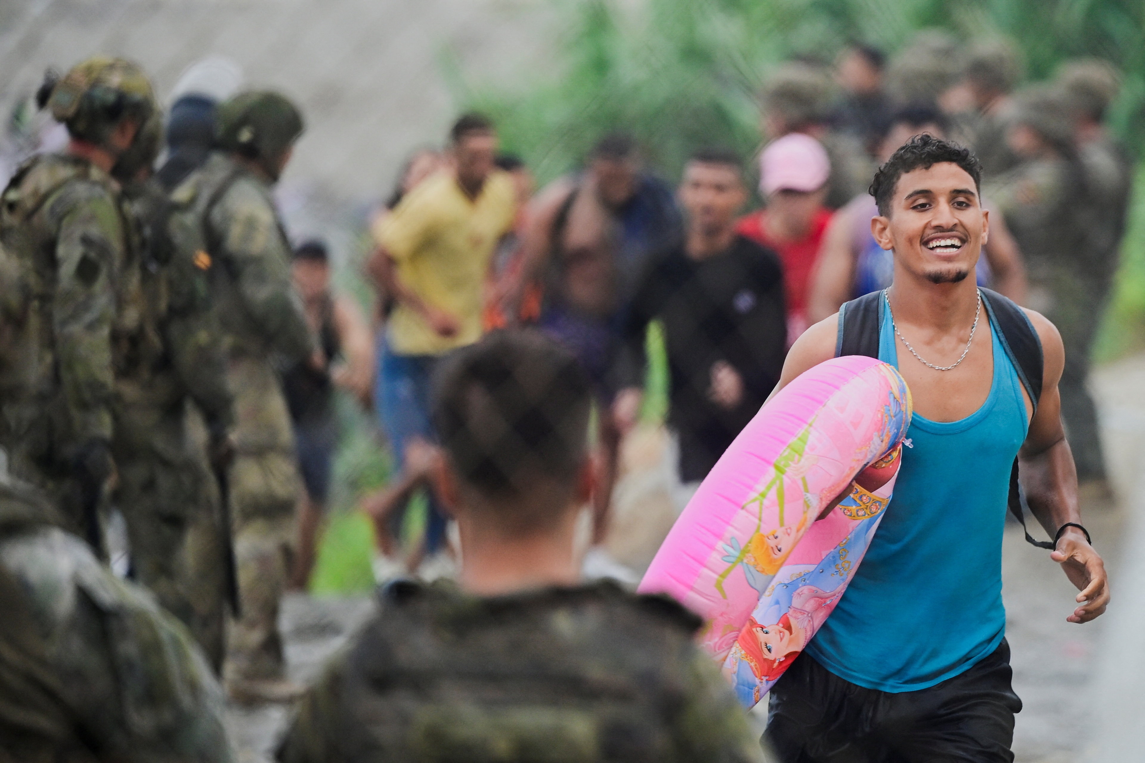 A migrant from Morocco reacts as he arrives at the Spanish border, in Ceuta. (Reuters)
