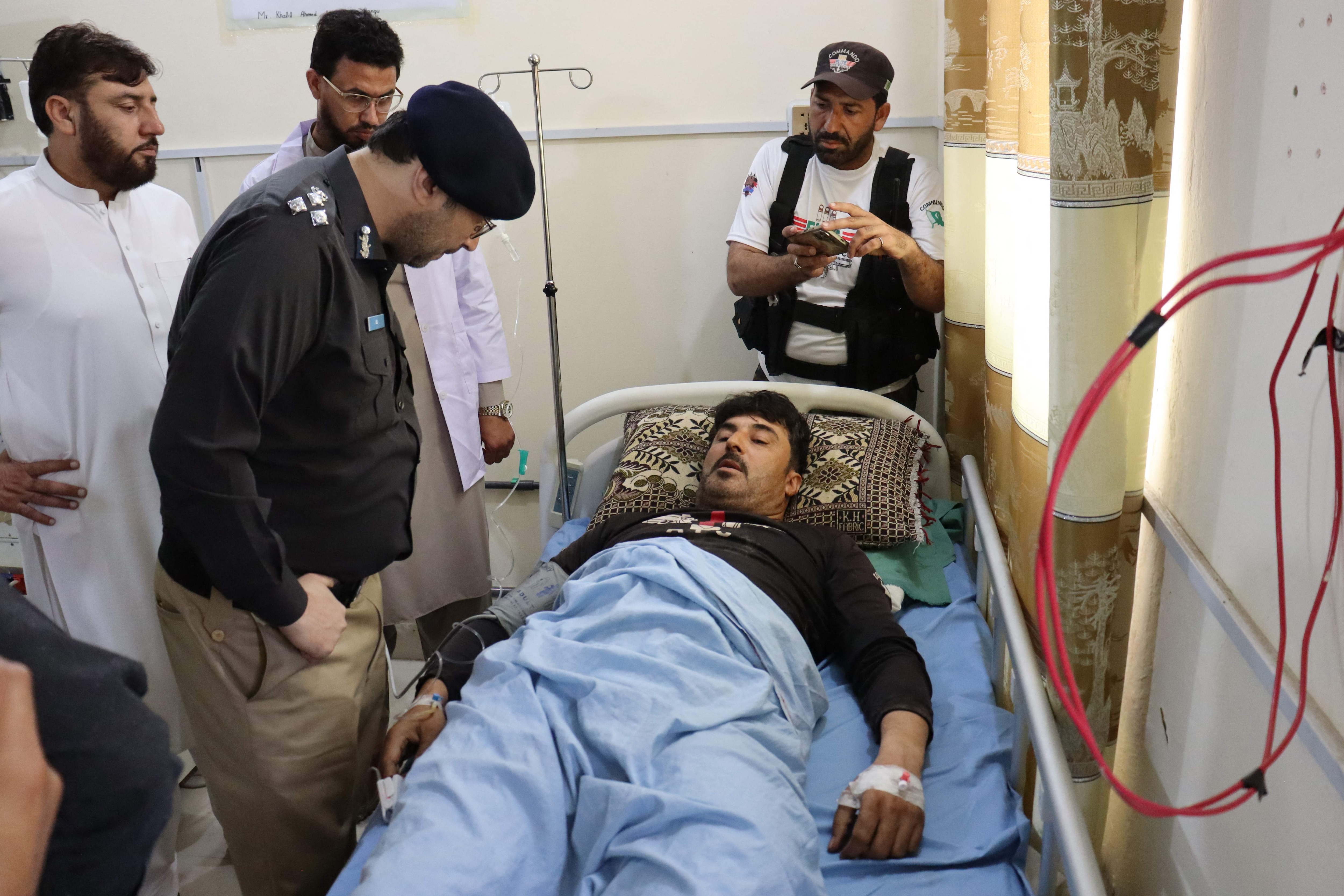 A police officer visits an injured policeman at a hospital, after a militant attack on a checkpoint at Hangu district in Pakistan's Khyber Pakhtunkhwa. (AFP) A police officer visits an injured policeman at a hospital, after a militant attack on a checkpoint at Hangu district in Pakistan's Khyber Pakhtunkhwa. (AFP)