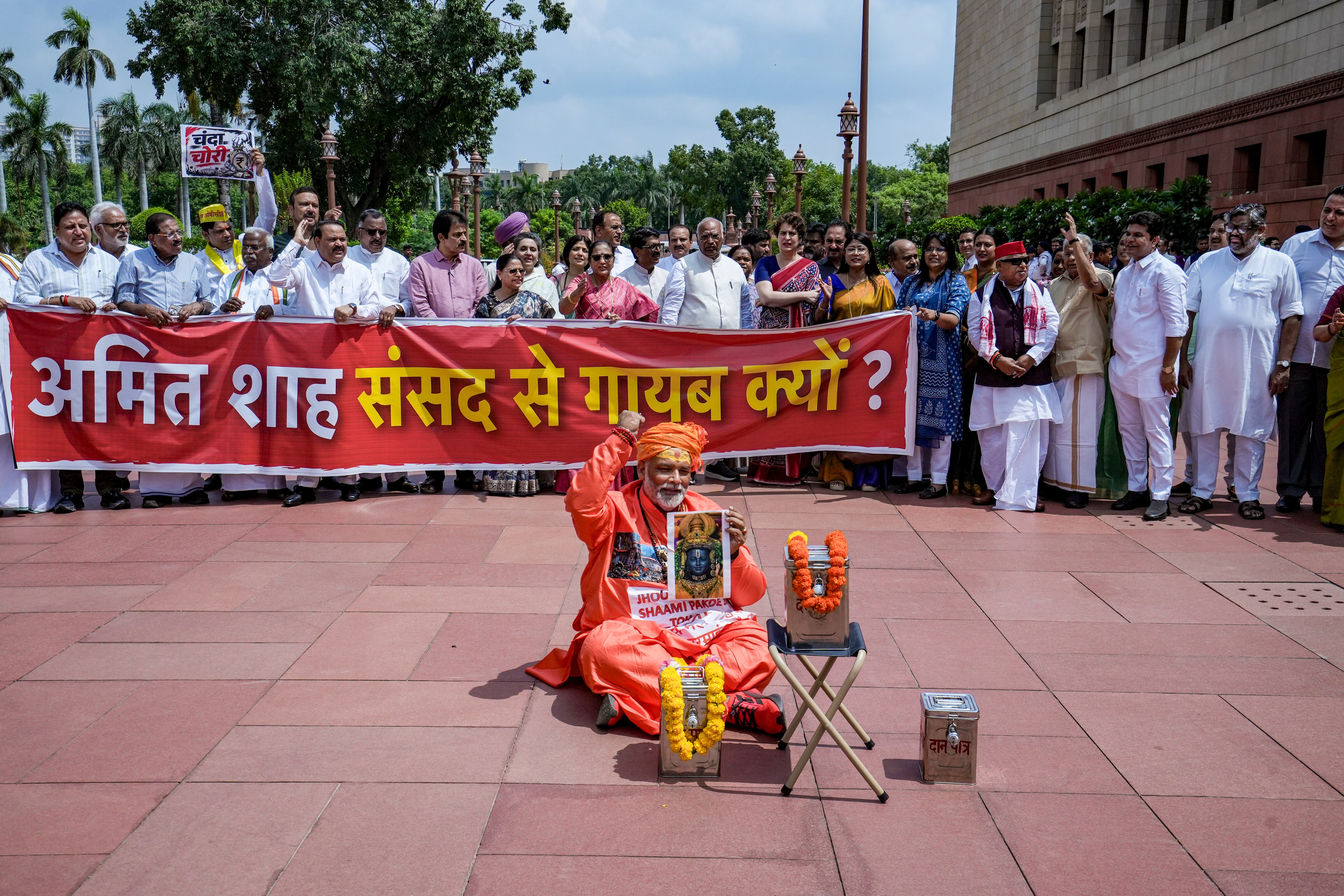 LoP in Rajya Sabha Mallikarjun Kharge, Samajwadi Party MPs Dimple Yadav, Audhesh Prasad, Dharmendra Yadav, Congress MPs Priyanka Gandhi Vadra, KC Venugopal, Independent MP Rajesh Ranjan, TMC MP Sagarika Ghose, JMM MP Mahua Maji, Shiv Sena (UBT) MP Arvind Sawant and others stage a protest over the alleged embezzlement of donations at Ayodhya's Shri Ram Temple. (PTI) LoP in Rajya Sabha Mallikarjun Kharge, Samajwadi Party MPs Dimple Yadav, Audhesh Prasad, Dharmendra Yadav, Congress MPs Priyanka Gandhi Vadra, KC Venugopal, Independent MP Rajesh Ranjan, TMC MP Sagarika Ghose, JMM MP Mahua Maji, Shiv Sena (UBT) MP Arvind Sawant and others stage a protest over the alleged embezzlement of donations at Ayodhya's Shri Ram Temple. (PTI)