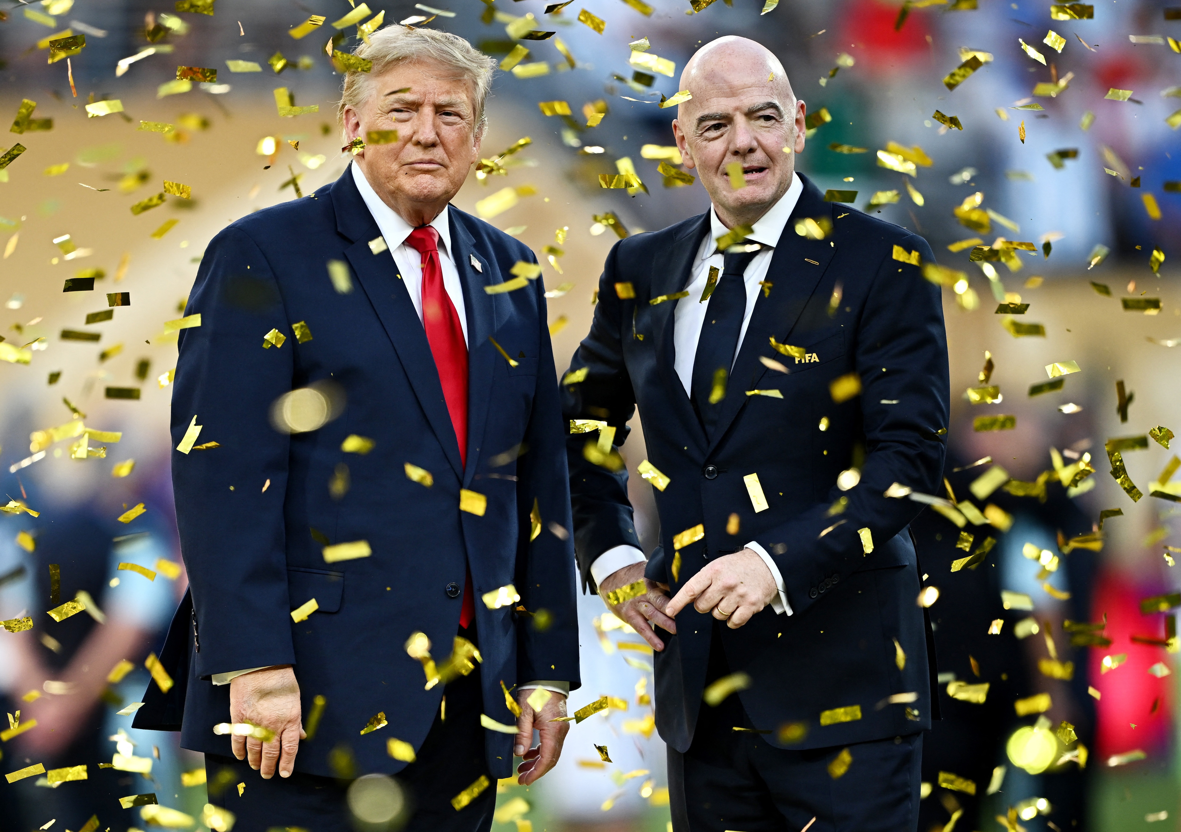 US President Donald Trump and Fifa president Gianni Infantino during the trophy presentation after the world cup final, in New Jersey. (Reuters)