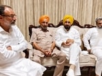 Charanjit Singh Channi and other party functionaries at former Ghanaur MLA Madan Lal Jalalpur’s residence on Saturday. (HT)