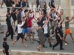 Spanish police cracks down on migrants to send them back amid a political battle.