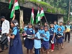 Holding empty plates, students demanded that the state government immediately release foodgrains and funds to cover the cost of essentials and the cooking being done informally so that students don’t go hungry.