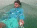 Holding the selfie stick out in front of him, the man recorded his own swim through the water.