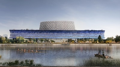 The Grand Canal Museum in Hangzhou, China, floats above ground level. The space beneath will serve as a public plaza, while open-access rooftop walkways and a sky garden will offer elevated views of the canal. This canal is what it has been built to celebrate. Called a “manmade river”, it links Beijing and Hangzhou, and parts of it date to 500 BCE. The museum was designed by Swiss architecture firm Herzog & de Meuron. The Grand Canal Museum in Hangzhou, China, floats above ground level. The space beneath will serve as a public plaza, while open-access rooftop walkways and a sky garden will offer elevated views of the canal. This canal is what it has been built to celebrate. Called a “manmade river”, it links Beijing and Hangzhou, and parts of it date to 500 BCE. The museum was designed by Swiss architecture firm Herzog & de Meuron.
