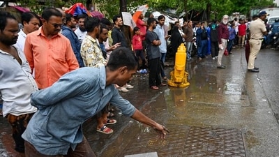 A 55-year-old man died after falling into an open manhole in Saki Naka during maintenance work on July 2 (Raju Shinde/HT Photo) A 55-year-old man died after falling into an open manhole in Saki Naka during maintenance work on July 2 (Raju Shinde/HT Photo)