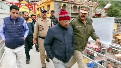 Special Investigation Team (SIT) formed by the Uttarakhand government arrives to inspect the Badrinath Temple premises. (ANI Video Grab)