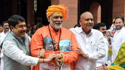 The Opposition MPs in an unusual display of protest used street theatre to protest against the alleged embezzlement of donations . (ANI)