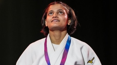Asmita Dey poses with her gold medal during the victory ceremony for the Women's 48kg judo event at the Commonwealth Games, (PTI) Asmita Dey poses with her gold medal during the victory ceremony for the Women's 48kg judo event at the Commonwealth Games, (PTI)