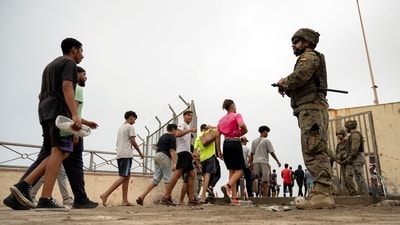 Several videos circulating on social media show Moroccan migrants reportedly crossing into Ceuta. (File Photo/AFP)
