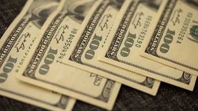 Representational image showing US dollars. (Unsplash) Representational image showing US dollars. (Unsplash)