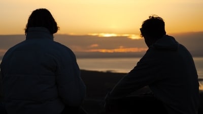 Experts share simple ways NRIs can cope with homesickness while adjusting to life abroad. (Unsplash)