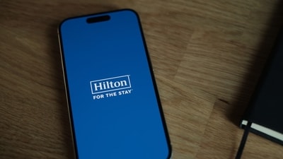 The Hilton app is seen on a phone. (Unsplash) The Hilton app is seen on a phone. (Unsplash)