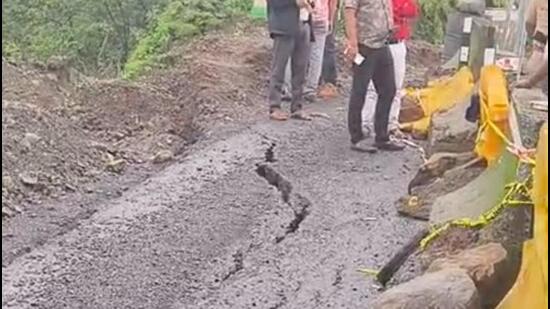Movement of heavy vehicles through Amba Ghat on National Highway 166 has been suspended due to road cracks and risk of landslides triggered by continuous heavy rainfall. (HT)
