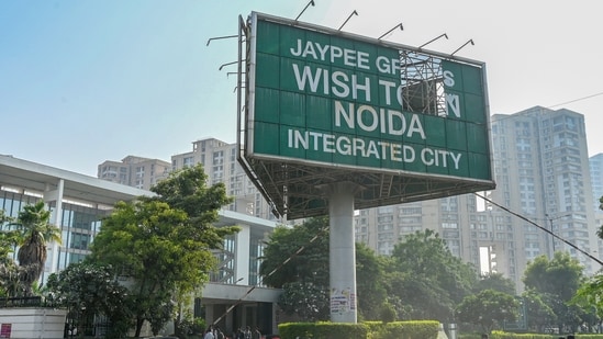 Suraksha Group, which acquired debt-ridden Jaypee Infratech Ltd (JIL) in 2024, has said it has completed construction of 7,913 flats across 84 towers in Noida’s Wish Town township(Representational photo) (Photo by Sunil Ghosh / Hindustan Times) (HT Photo)