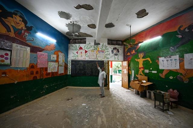 A damaged classroom ceiling at a government school in Sukhrali near Sector 17C, seen on Friday. (Parveen Kumar/HT) A damaged classroom ceiling at a government school in Sukhrali near Sector 17C, seen on Friday. (Parveen Kumar/HT)