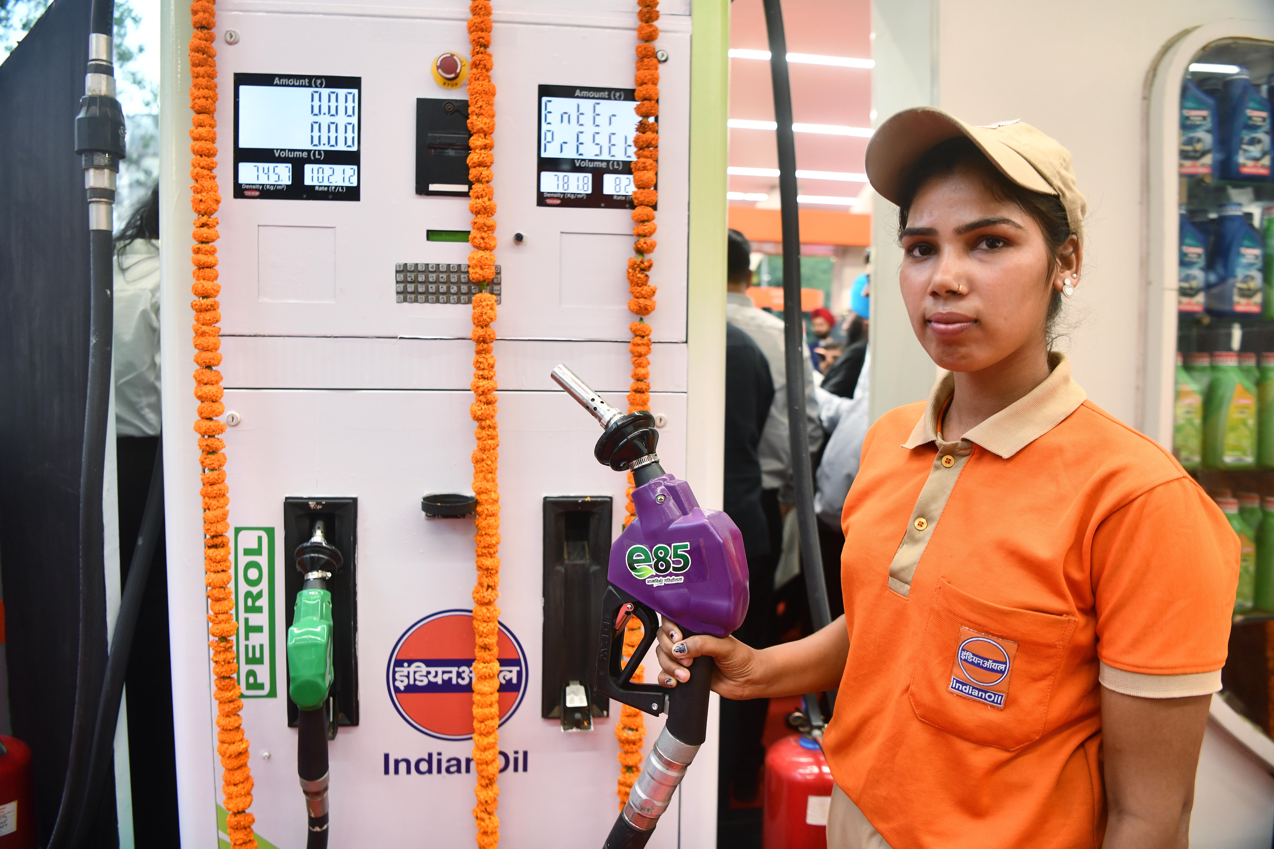 A worker poses for a picture with an E85 fuel dispenser machine during the launch of E85 fuel in New Delhi. (ANI) A worker poses for a picture with an E85 fuel dispenser machine during the launch of E85 fuel in New Delhi. (ANI)